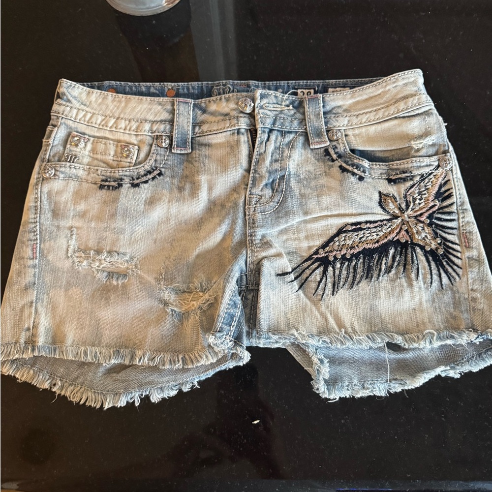Miss Me Blue Jean Shorts with Distressed Look and Artistic Design